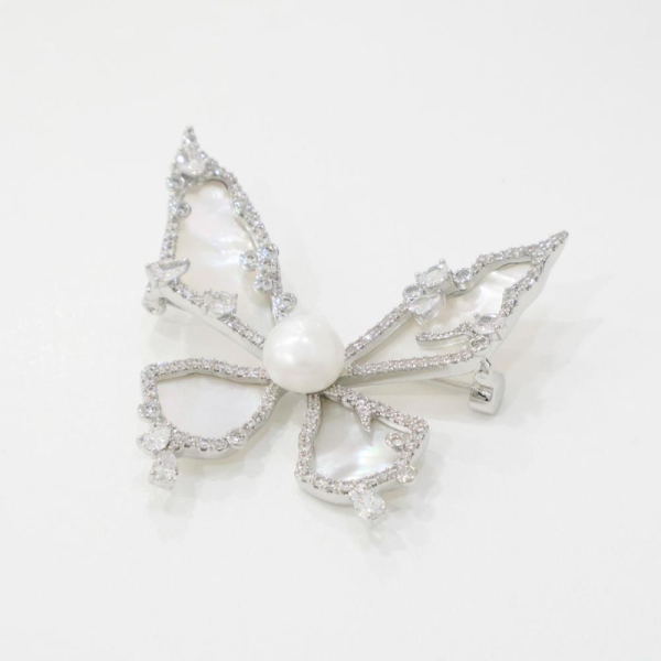 VY female white silver butterfly glitter gold brooch