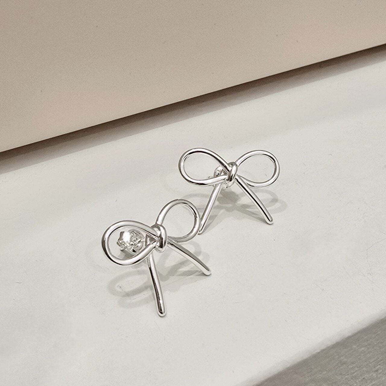 Ownerclan popular product S403 women big ribbon design earrings daily earings sterling silver [WFMI9