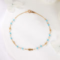 14K gold cuff bracelet with fish and turquoise stone.cuttlebone chain PNB42104