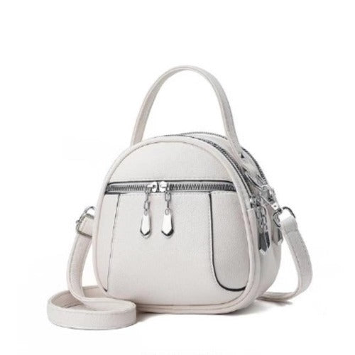 Women's leather round zipper mini top handle crossbody 636661