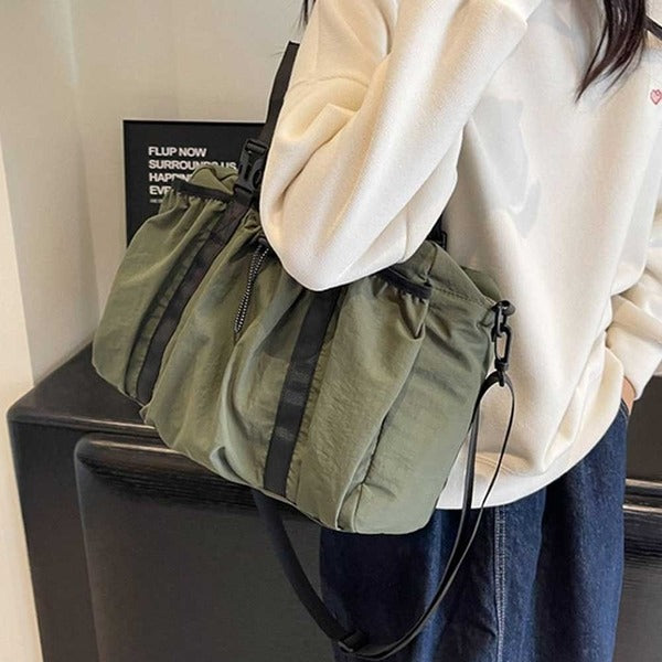 Beommole 847EEM98 Men's and Women's String Pocket CrossShoulder Sling Bag