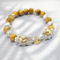 Pretty good fortune bracelet with 8mm gold howlite (29735900A)
