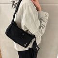 Domestic Official Store Kangol Bag Essential X Small Crossbody 3387 Black Slingshot