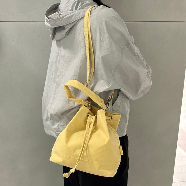 Kangol official store, Kangol nylon amber bucket bag 3392 yellow crossbody slingback