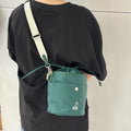 Kangol bag Riora bucket crossbody 3399 green slingback