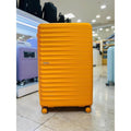 AmericanTourister SaveZone07 Samso FASTFORWARD 29 inch carrier orange expandable cargo TSA lock MI08
